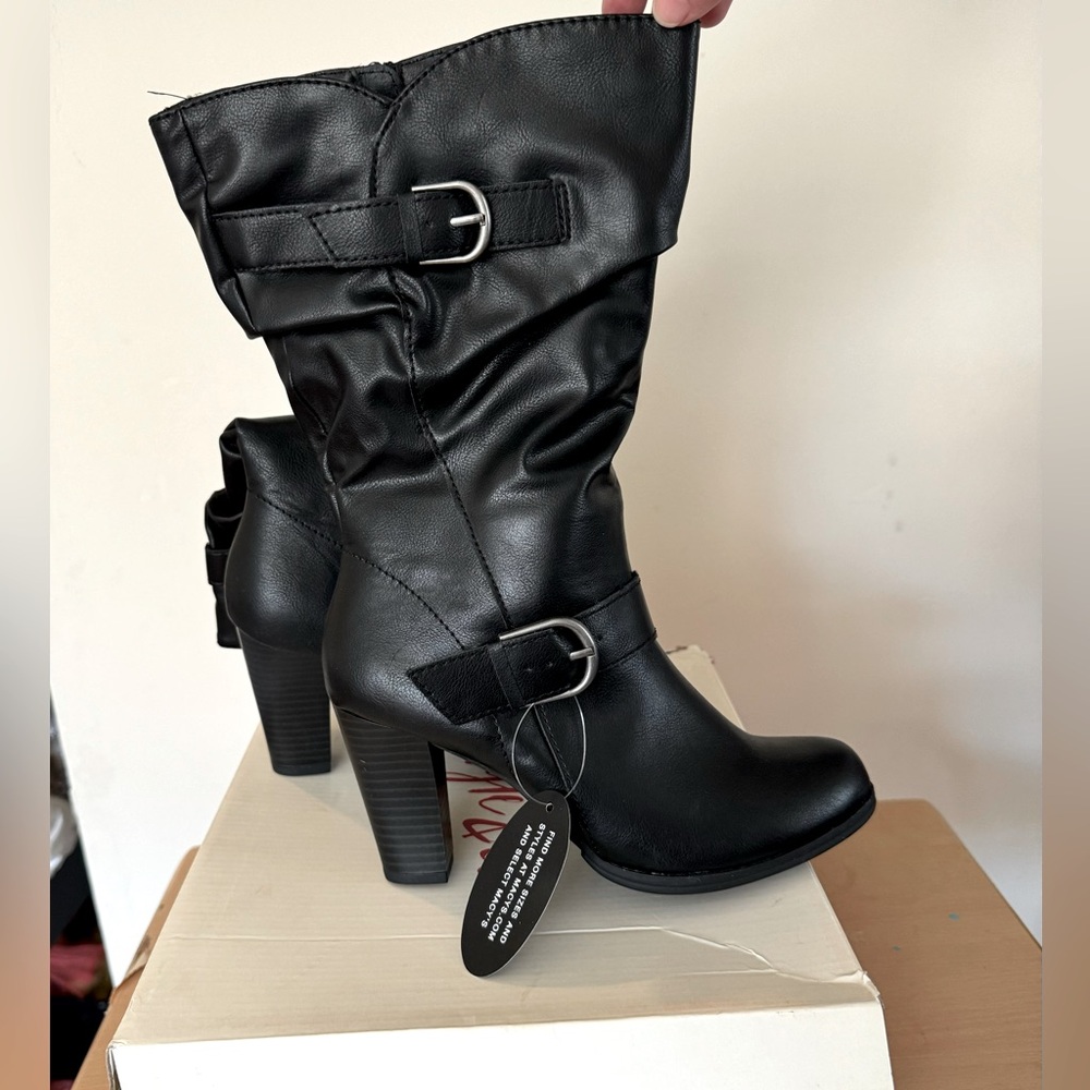 High heel boots, new with tag. Very pretty and comfortable.